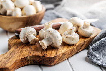 Fresh white champignon mushrooms.