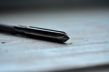 Photo of metal reamer on the table