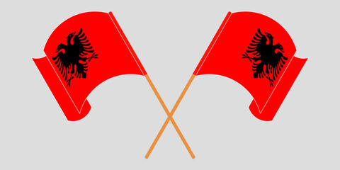 Crossed and waving flags of Albania