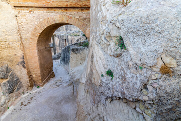 Saint Barbara's fortress in the center of Alicante, Spain. Arch and stone walls.