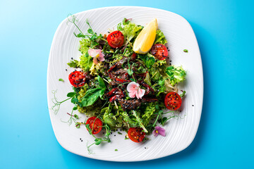 vegetable salad on a blue background