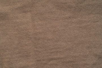 Fototapeta na wymiar light brown fabric texture close, macro shot