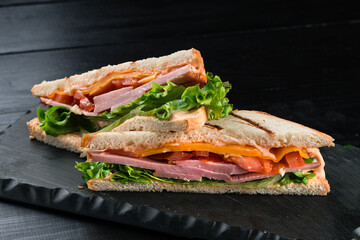 grilled sandwich with ham and salad