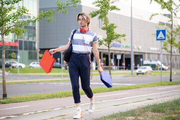 Young gay man shopping