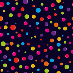 Bright geometric pattern of multicolored balls on a dark background.