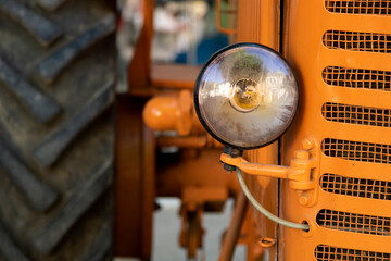 Front view of an orange tractor