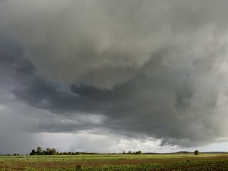 Fototapeta premium stormy clouds over the field
