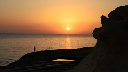 Sunrise over Xwejni Saltpans in Gozo (Island of Malta)