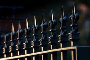 Metallic fence in dark background