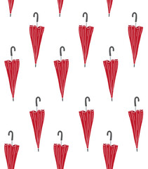 Obraz premium Vector seamless pattern of red colored hand drawn doodle sketch umbrella isolated on white background