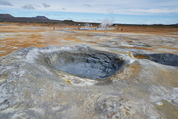 Hverir geothermal area in the north of Iceland near Lake Myvatn, with geothermal lake, looking like...