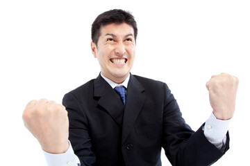 ガッツポーズするビジネスマン