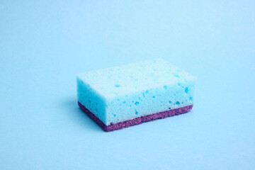 blue Kitchen sponge blue background copy sapce