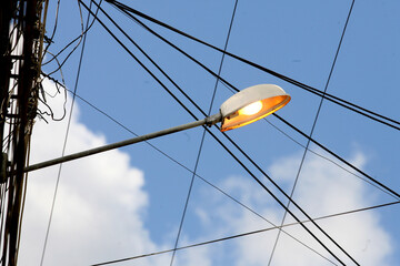 itabuna, bahia / brazil - april 13, 2012: street lamp post is seen lit during the day in the city...