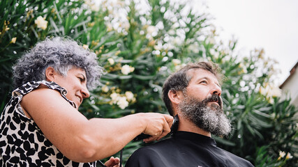 Fototapeta premium Bearded Man Getting Haircut