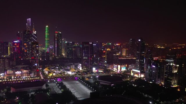 night illuminated guangzhou city downtown famous mall traffic street aerial panorama 4k china