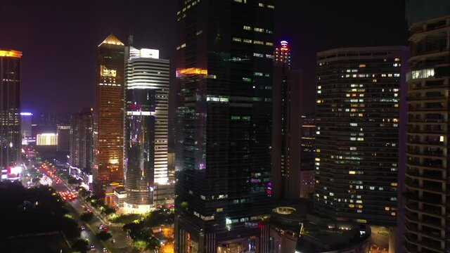 night illuminated guangzhou city downtown traffic street aerial panorama 4k china