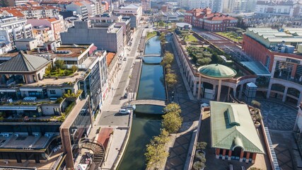 Obraz premium Aerial view of the city of Aveiro Portugal. Beautiful image of the canals, boats and historic center of Aveiro