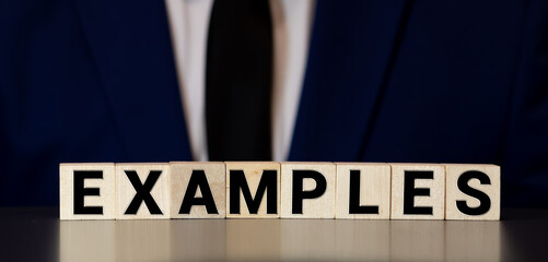 EXAMPLES word written on wood block