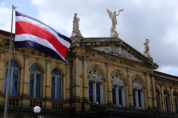 Fototapeta na wymiar Costa Rica San Jose - National Theater of Costa Rica - Teatro Nacional de Costa Rica and national flag