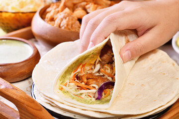 Traditional Mexican food, burritos with meat and cheese