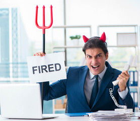 Devil angry businessman in the office