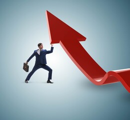 Businessman supporting growtn in economy on chart graph