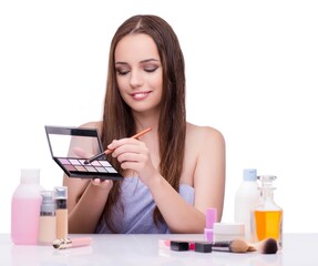 Young woman in beauty make-up isolated on white