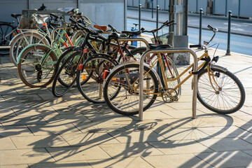 Fototapeta na wymiar Rental bicycle pick-up station on city street in Krakow, Poland