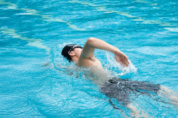 Women swim in a freestyle swimming style that is standard swimming.