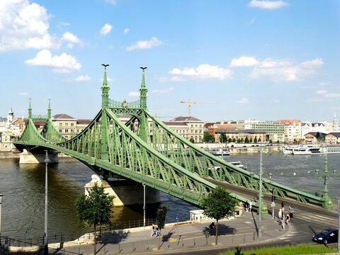 The Liberty Bridge in Budapest in Hungary, it connects? Buda ?and? Pest cities? across the? Danube river. It is known as Freedom Bridge in English, and the shortest bridge in Budapest city.