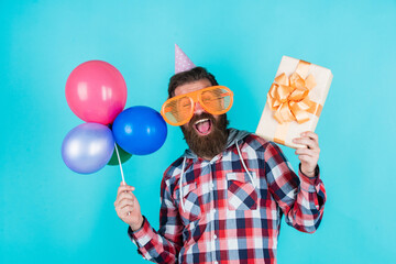Going for shopping. hipster smiling with balloon. Celebrating happy party. Party Elements and...