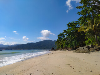 Tropical beach with blue sky and clean sand in Indonesia