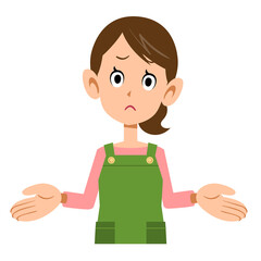 両手を広げて呆れるエプロンをつけた女性の上半身
