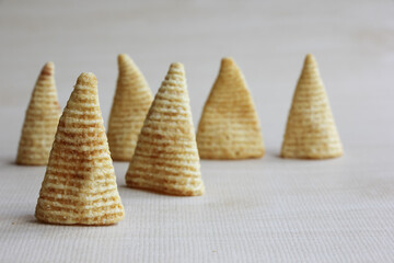 Cone of Corns Snack. Yellow, puffed.