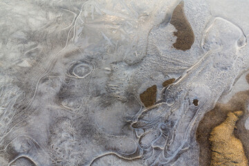 Hoarfrost and fresh powder snow in winter, on a wild, beautiful, river bank
