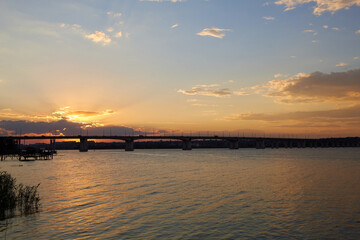 Fototapeta premium sunset over the river
