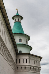 Fototapeta na wymiar Multi-tiered tower in an Orthodox monastery