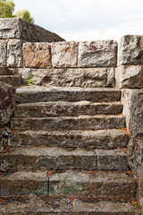 a medieval stone staircase leading up to a castle