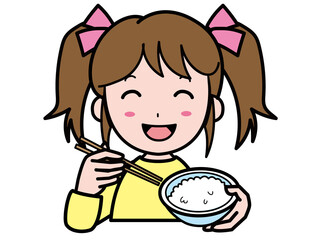 おいしそうにご飯を食べる女の子