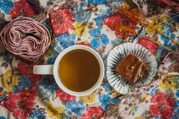 Cup of tea with sweets