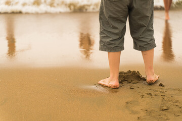 man walking on the beach