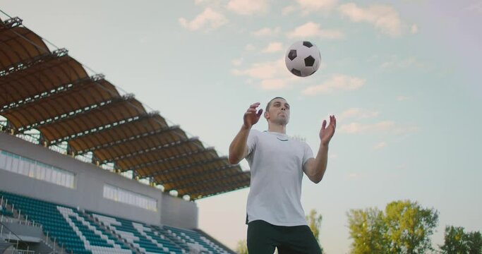 Hispanic Soccer Player heading the ball. Soccer Football Player making Header. Soccer Football Player making Header. 