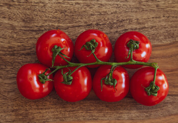 red tomatoes on a wooden table