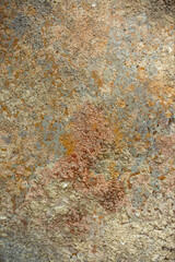 Old wall with damaged plaster and abstract stains. Rough brown, rusty texture, abstract wall background, vintage surface.