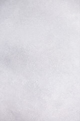 Light wall with abstract spots. Beautiful gray, white texture, abstract wall surface background, vintage surface texture with copy space, unusual spotty surface.