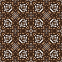 Elegant Indonesian batik motifs with simple brown color design.