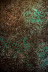 Beautiful dark green texture abstract wall background, ribbed surface texture with copy space, unusual mottled brown surface background