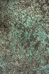 Beautiful dark green texture abstract wall background, ribbed surface texture with copy space, unusual mottled brown surface background