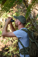 man with binoculars